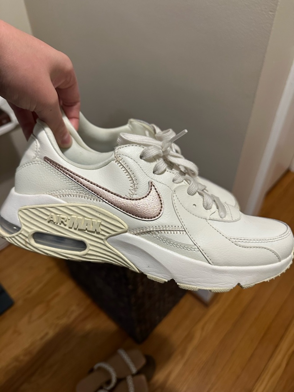 Nike Women's White Sneakers with Metallic Pink Swoosh